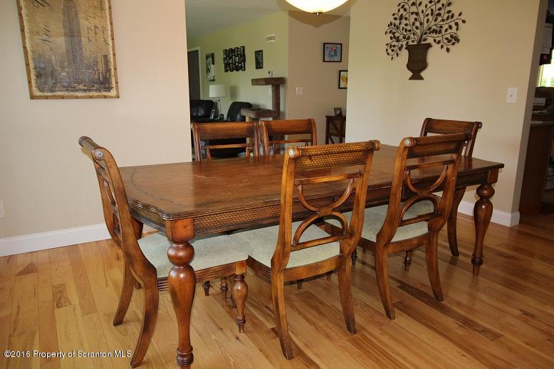 1620 Cortez Road Lake Ariel, PA 18436 - Photo 30 of 80 a dining room with furniture and wooden floor