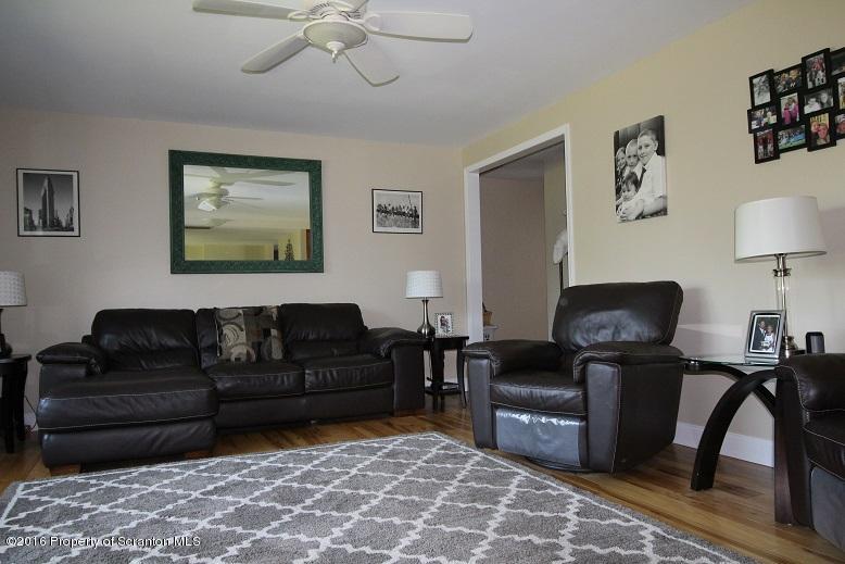 1620 Cortez Road Lake Ariel, PA 18436 - Photo 33 of 80 a living room with furniture and a lamp