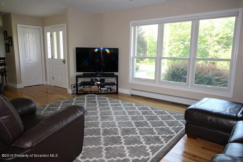 1620 Cortez Road Lake Ariel, PA 18436 - Photo 35 of 80 a living room with furniture and a flat screen tv