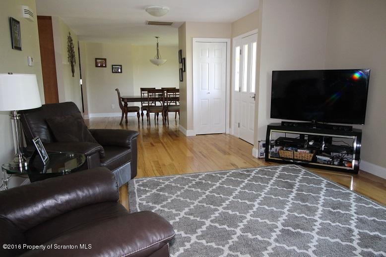 1620 Cortez Road Lake Ariel, PA 18436 - Photo 36 of 80 a living room with furniture and a flat screen tv