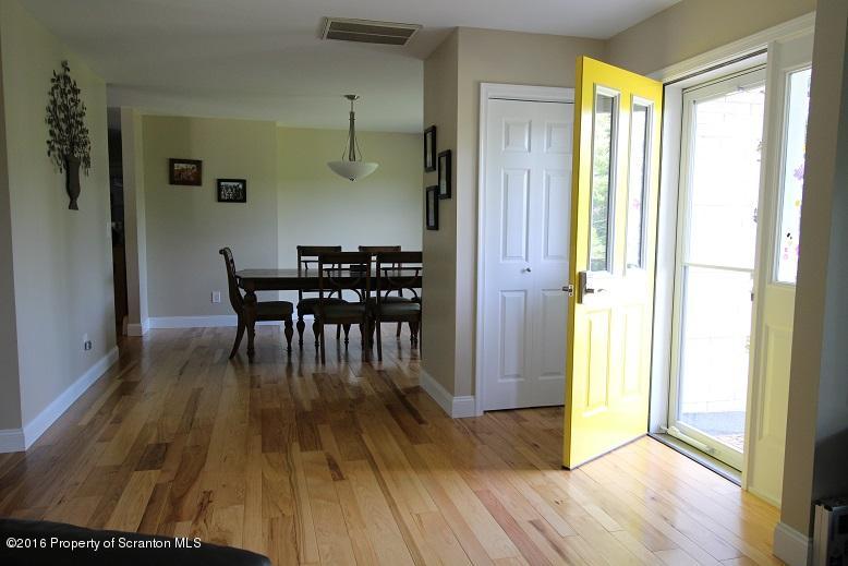 1620 Cortez Road Lake Ariel, PA 18436 - Photo 38 of 80 a dining room with furniture and wooden floor