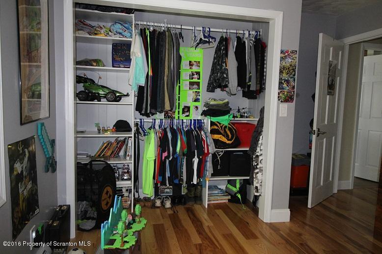 1620 Cortez Road Lake Ariel, PA 18436 - Photo 46 of 80 a view of walk in closet with clothes and shoes