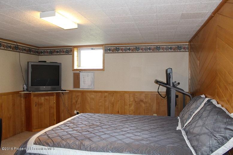 1620 Cortez Road Lake Ariel, PA 18436 - Photo 52 of 80 a bedroom with a bed and a flat screen tv
