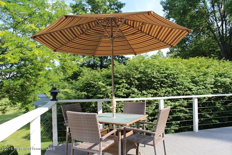 1620 Cortez Road Lake Ariel, PA 18436 - Photo 59 of 80 a roof deck with table and chairs