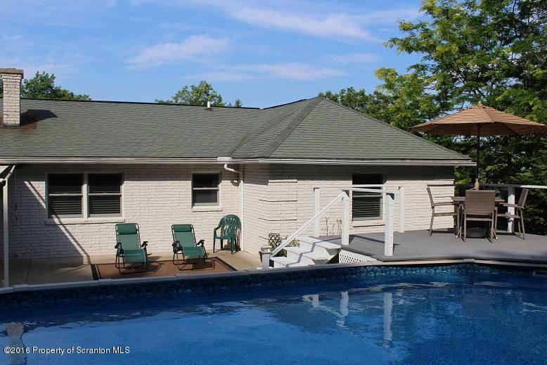 1620 Cortez Road Lake Ariel, PA 18436 - Photo 62 of 80 a view of a patio with table and chairs with wooden floor and fence