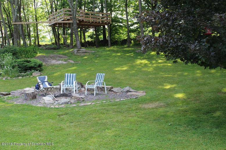 1620 Cortez Road Lake Ariel, PA 18436 - Photo 64 of 80 a view of a chair and table of the garden