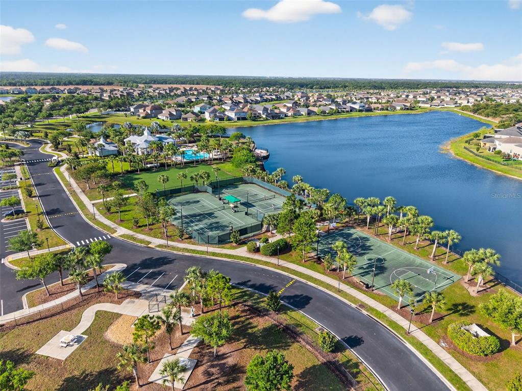 9324 Lemon Drop Loop Sun City Center, FL 33573 - Photo 30 of 32 view of a lake