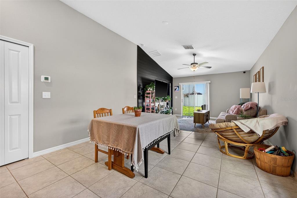 9324 Lemon Drop Loop Sun City Center, FL 33573 - Photo 10 of 32 a living room with furniture and a table