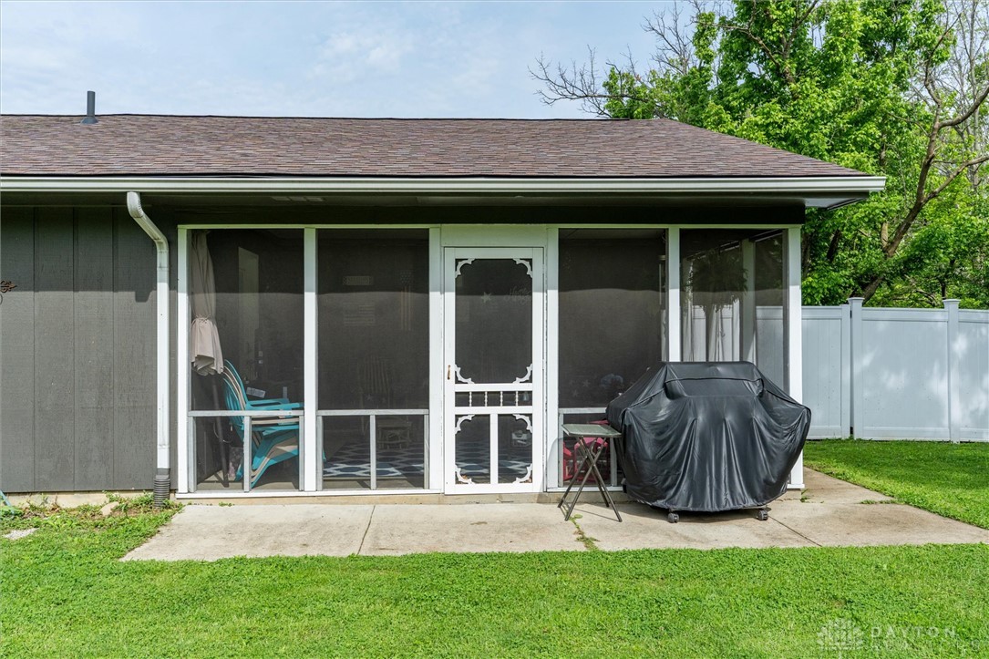 2165 Stewart Road Xenia, OH 45385 - Photo 53 of 59 This outdoor space offers a screened-in porch with direct access to a grassy yard.
