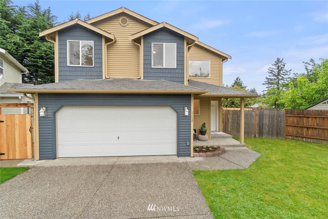 6018 Cady Road Everett, WA 98203 - Photo 1 of 16 a front view of a house with a yard