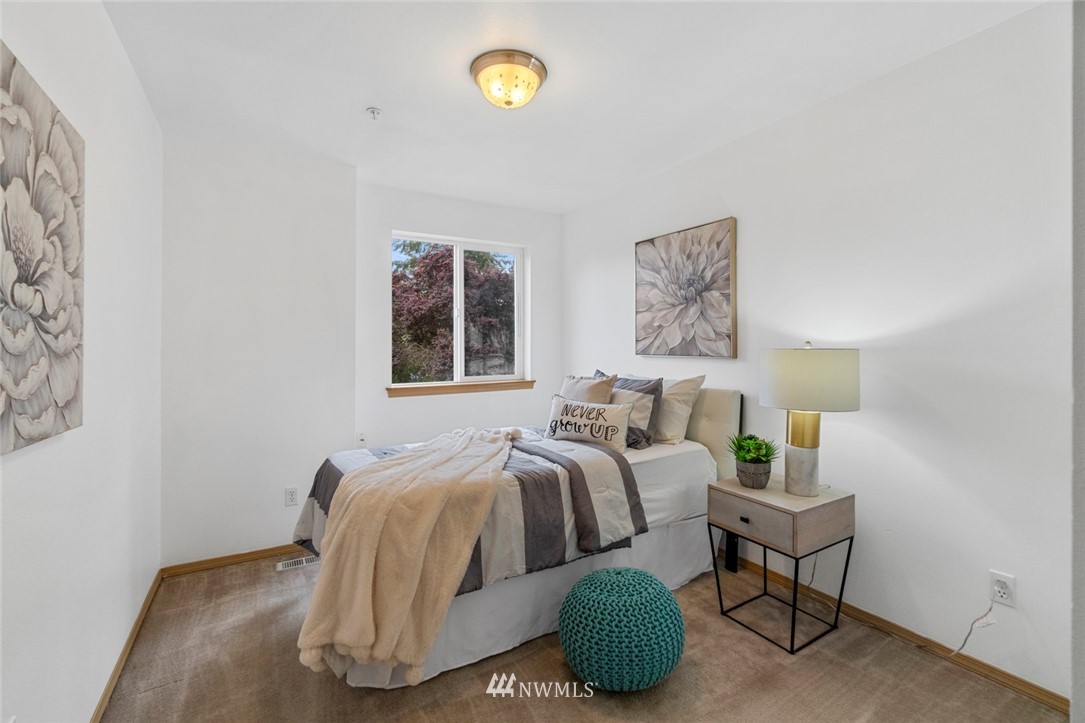 6018 Cady Road Everett, WA 98203 - Photo 11 of 16 a bedroom with a bed and a window