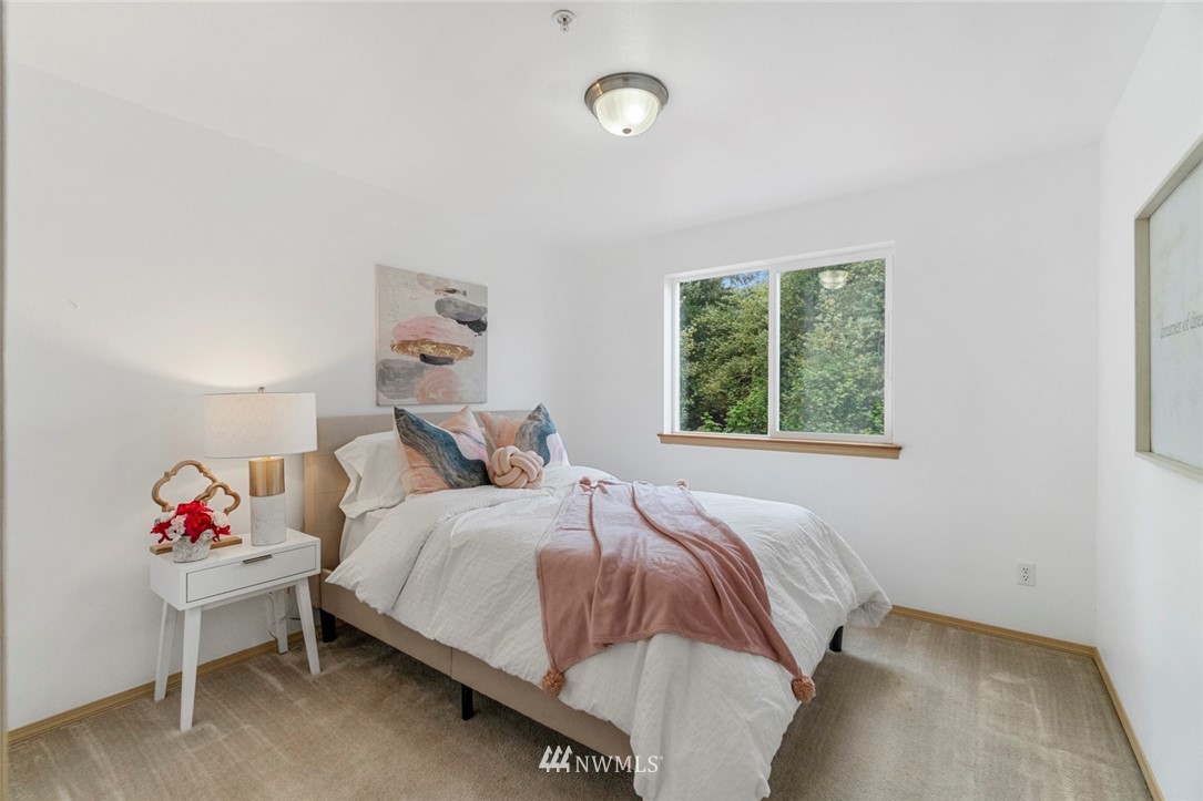 6018 Cady Road Everett, WA 98203 - Photo 12 of 16 a bedroom with a bed and a window