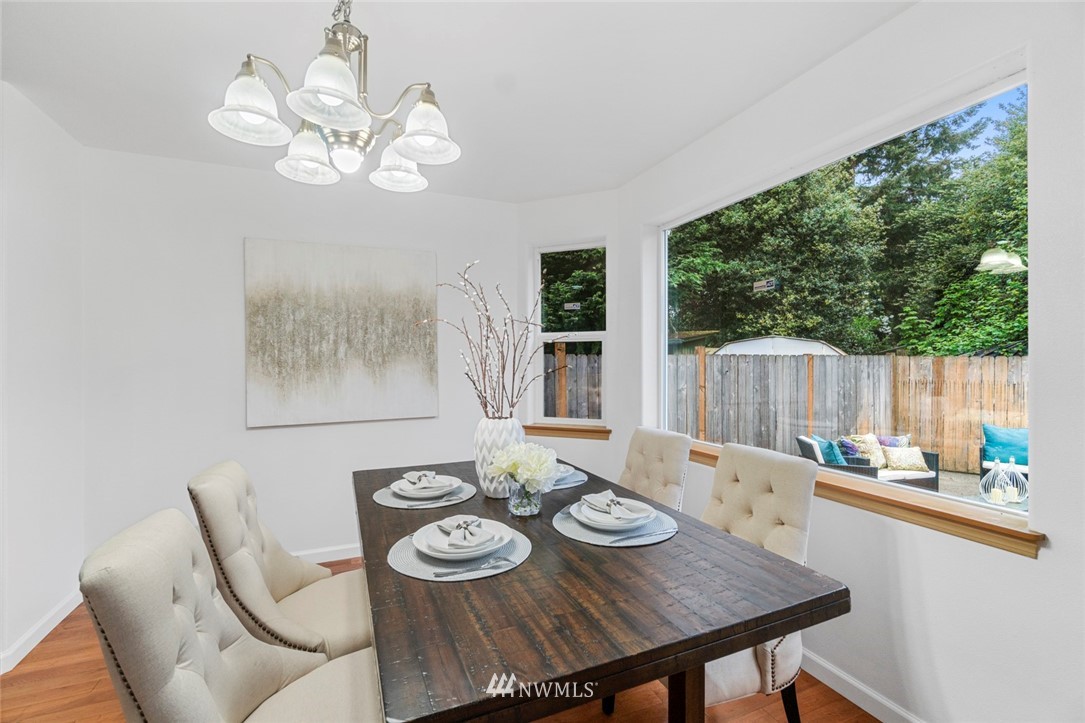6018 Cady Road Everett, WA 98203 - Photo 7 of 16 a view of a dining room with furniture window and outside view
