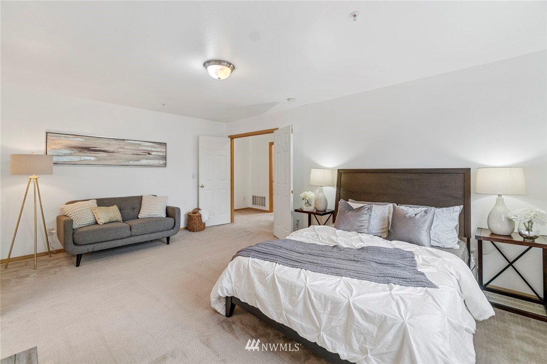 6018 Cady Road Everett, WA 98203 - Photo 8 of 16 a bedroom with a bed and a couch