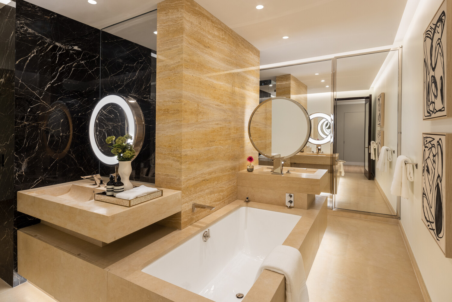 53 West 53rd Street, Unit 19A Manhattan, NY 10019 - Photo 7 of 11 a bathroom with a sink and a mirror