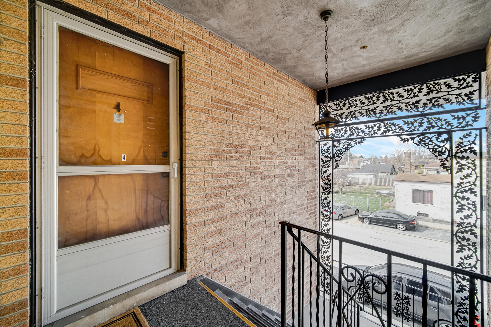 1104 169th Street Hammond, IN 46324 - Photo 15 of 20 a view of a glass door with a balcony