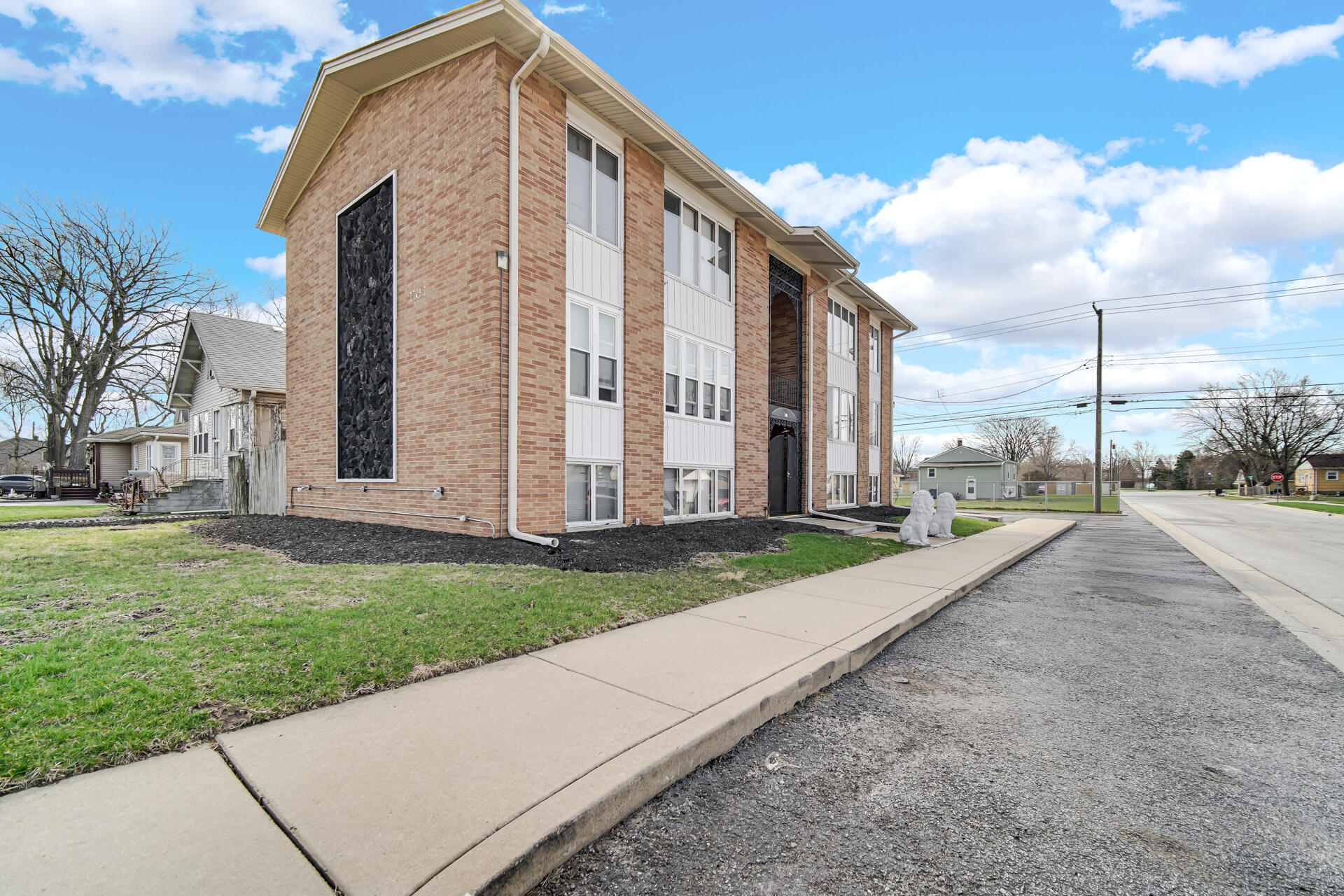 1104 169th Street Hammond, IN 46324 - Photo 2 of 20 a view of a house with a yard