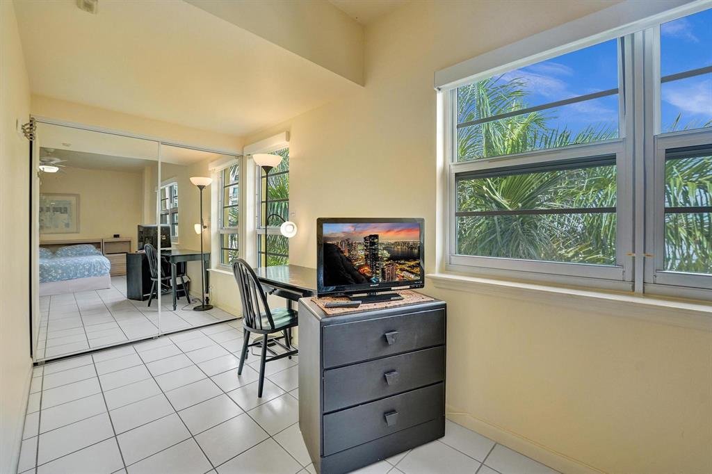 341 North Birch Road, Unit 416 Fort Lauderdale, FL 33304 - Photo 18 of 49 a view of a workspace with furniture and a window