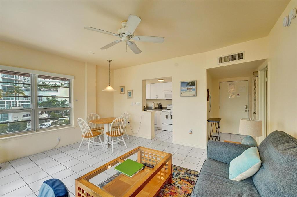341 North Birch Road, Unit 416 Fort Lauderdale, FL 33304 - Photo 23 of 49 a living room with furniture and a large window