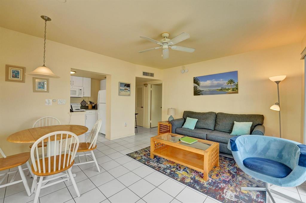 341 North Birch Road, Unit 416 Fort Lauderdale, FL 33304 - Photo 31 of 49 a living room with furniture and a table