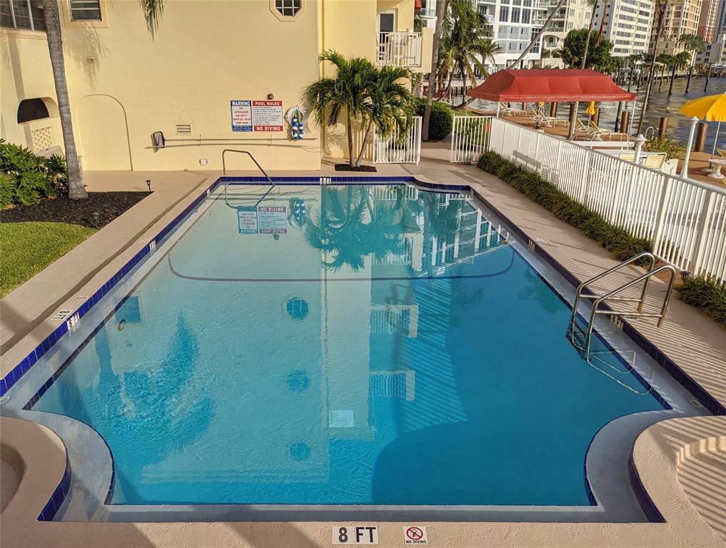 341 North Birch Road, Unit 416 Fort Lauderdale, FL 33304 - Photo 5 of 49 a view of swimming pool with a balcony