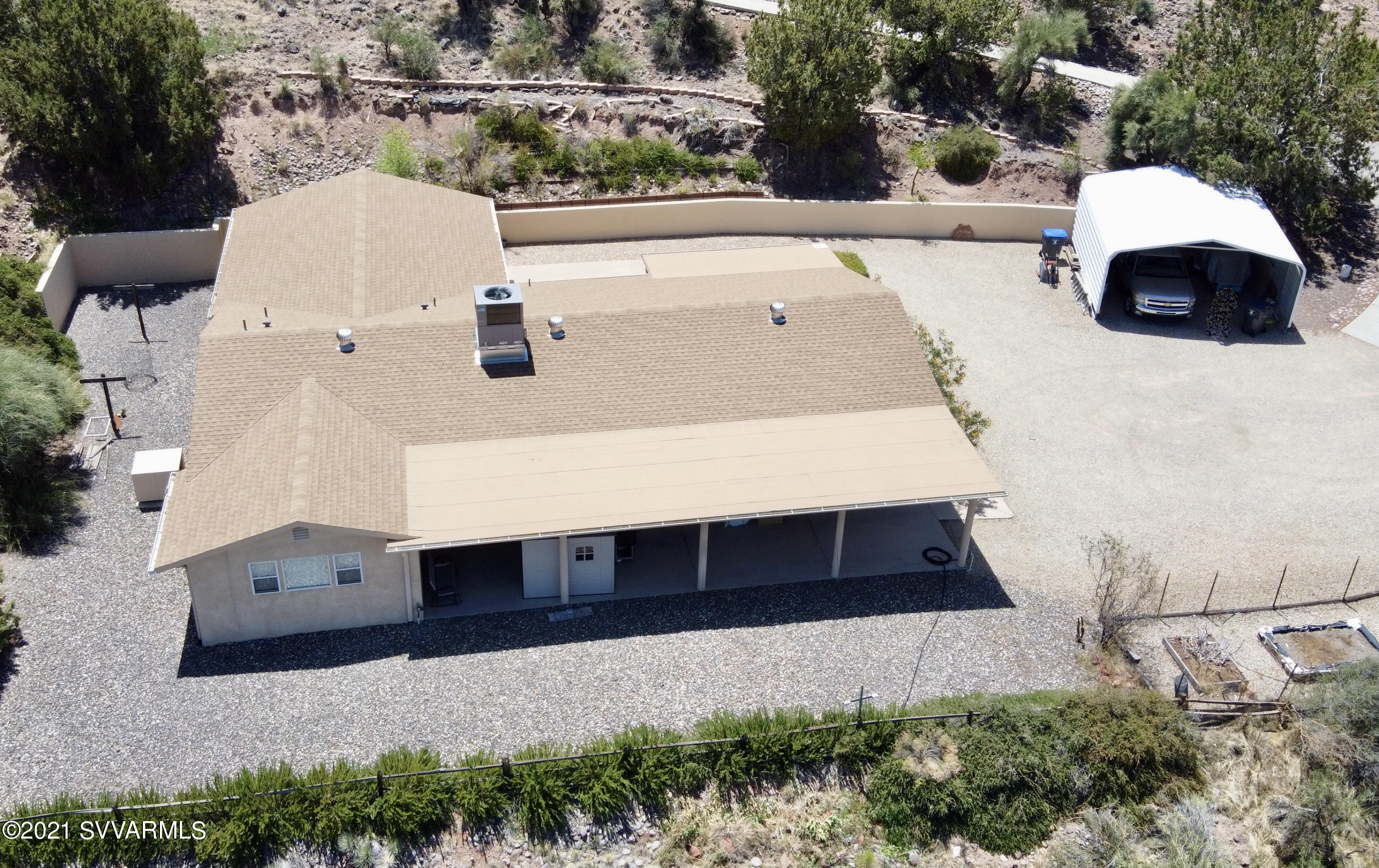 4580 North Valancius Way Rimrock, AZ 86335 - Photo 1 of 28 an aerial view of a house with yard and parking