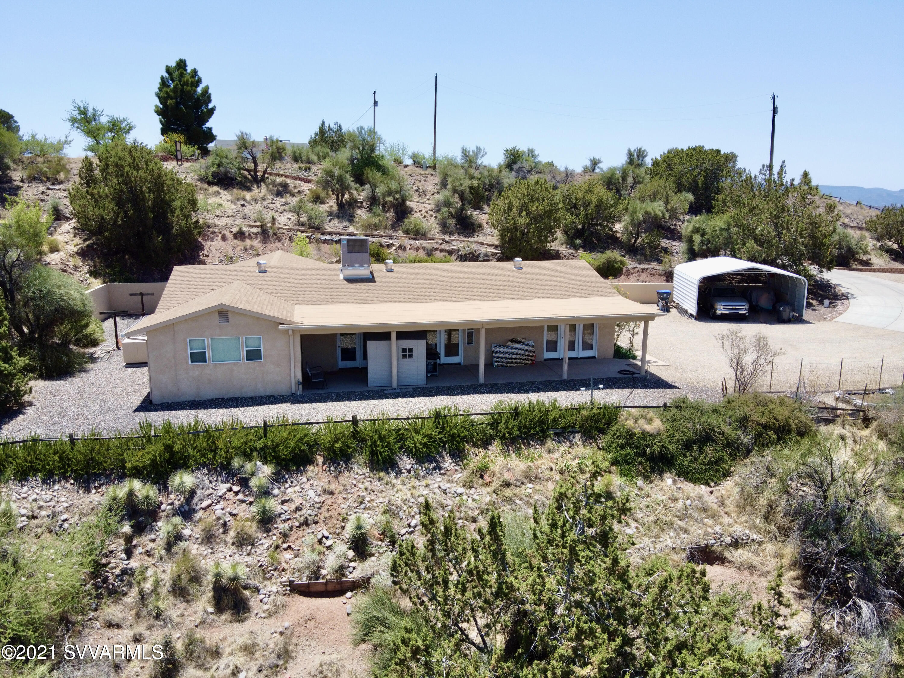 4580 North Valancius Way Rimrock, AZ 86335 - Photo 8 of 28 a view of a house with a yard and sitting area