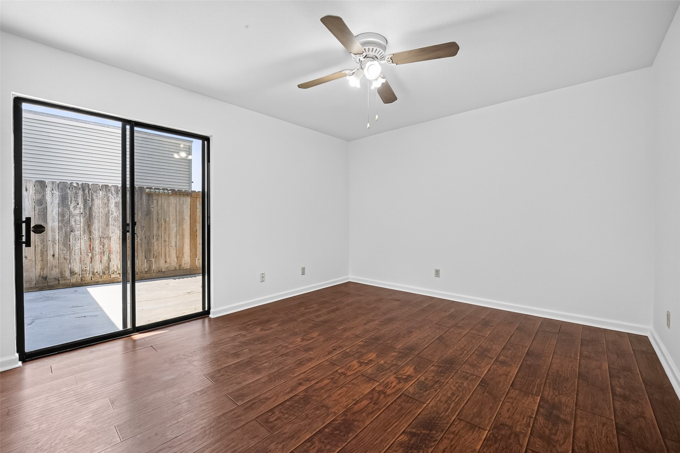6401 Deihl Road, Unit 902 Houston, TX 77092 - Photo 16 of 35 Experience seamless indoor-outdoor living in this bedroom with direct access to the inviting back patio.
