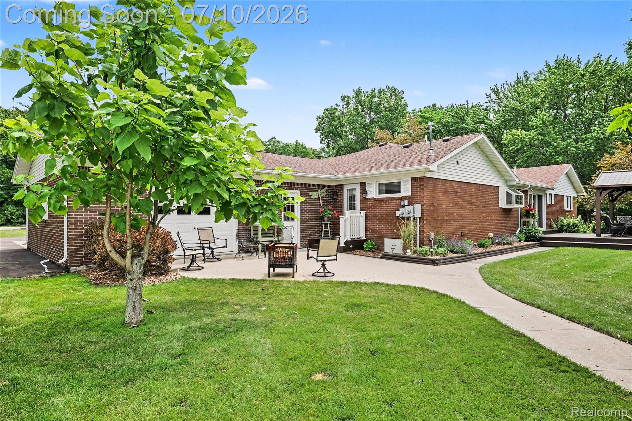 2180 Hurst Road St. Clair, MI 48079 - Photo 27 of 39 Expansive backyard featuring a manicured lawn and mature trees