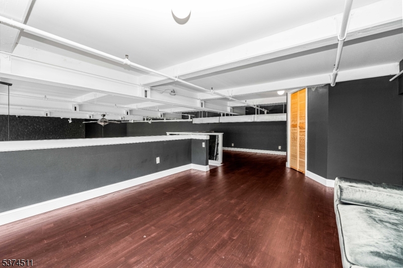 350 Scotland Road Orange, NJ 07050 - Photo 10 of 18 a view of a room with wooden floor