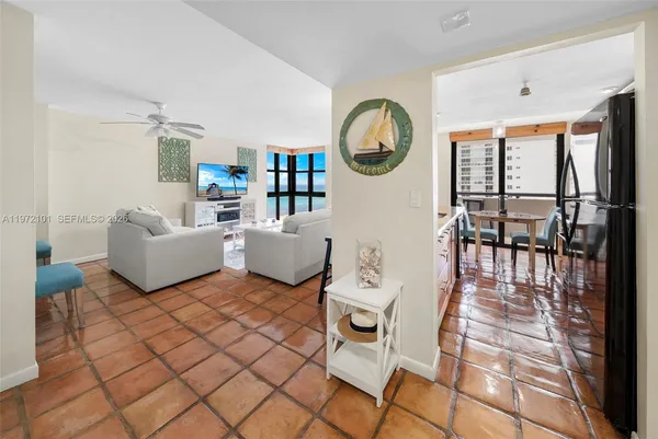 a living room with furniture and a window