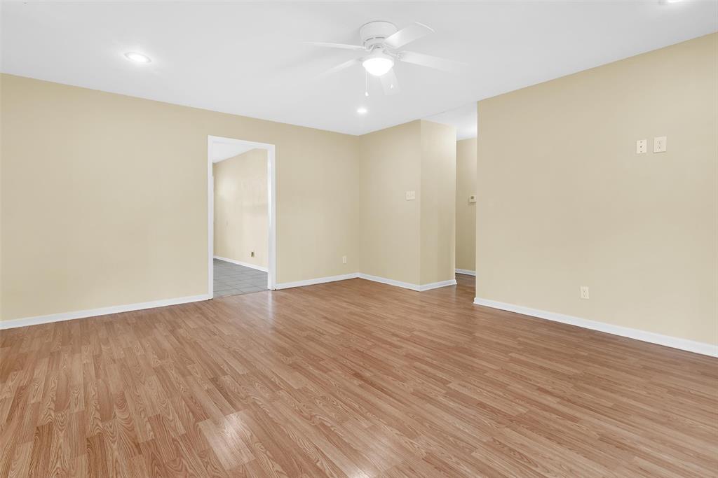146 Bob White Road Denison, TX 75020 - Photo 8 of 25 Dining room view toward the entry and bedroom hallway on the right