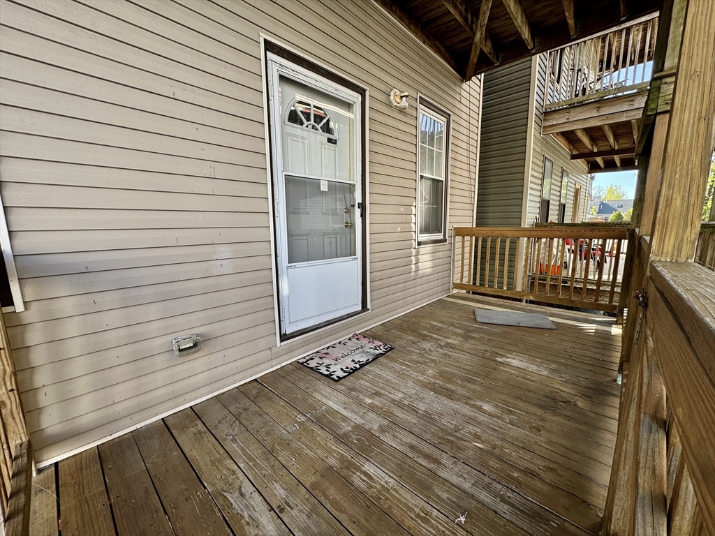 22 Elmore Street, Unit 2 Boston, MA 02119 - Photo 16 of 17 a view of a door and wooden floor