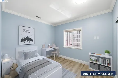 a bed room with a bed and a book shelf