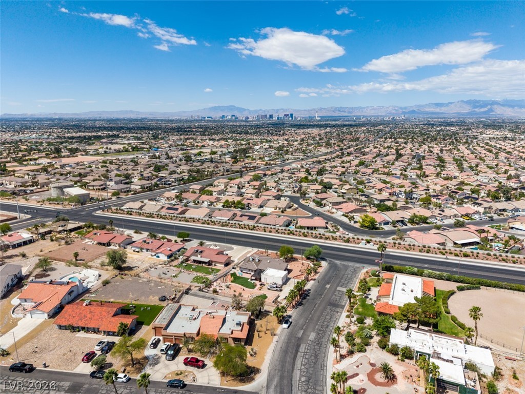 892 North Hollywood Boulevard Las Vegas, NV 89110 - Photo 73 of 81 This elevated view captures an expansive residential area under a bright sky.