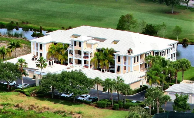 an aerial view of a house with a garden