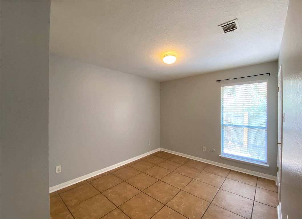2308 Wright Circle Round Rock, TX 78664 - Photo 14 of 17 an empty room with windows
