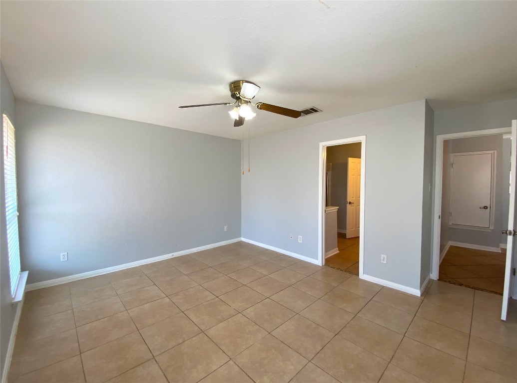 2308 Wright Circle Round Rock, TX 78664 - Photo 7 of 17 a view of an empty room and chandelier fan