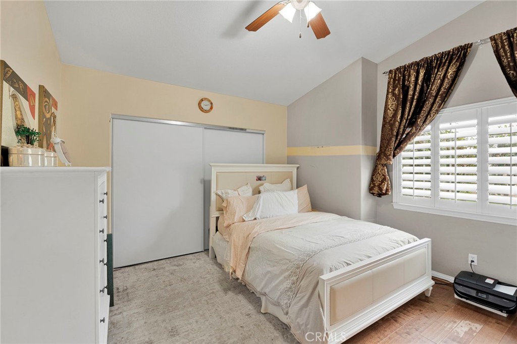 17777 Brazier Drive Riverside, CA 92508 - Photo 30 of 55 a bedroom with a bed and a window