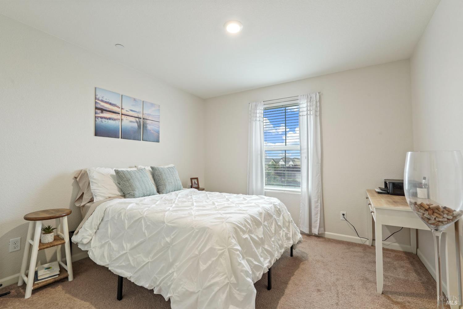 4725 Market Pl Square Rio Vista, CA 94571 - Photo 17 of 37 a bedroom with a bed and a desk