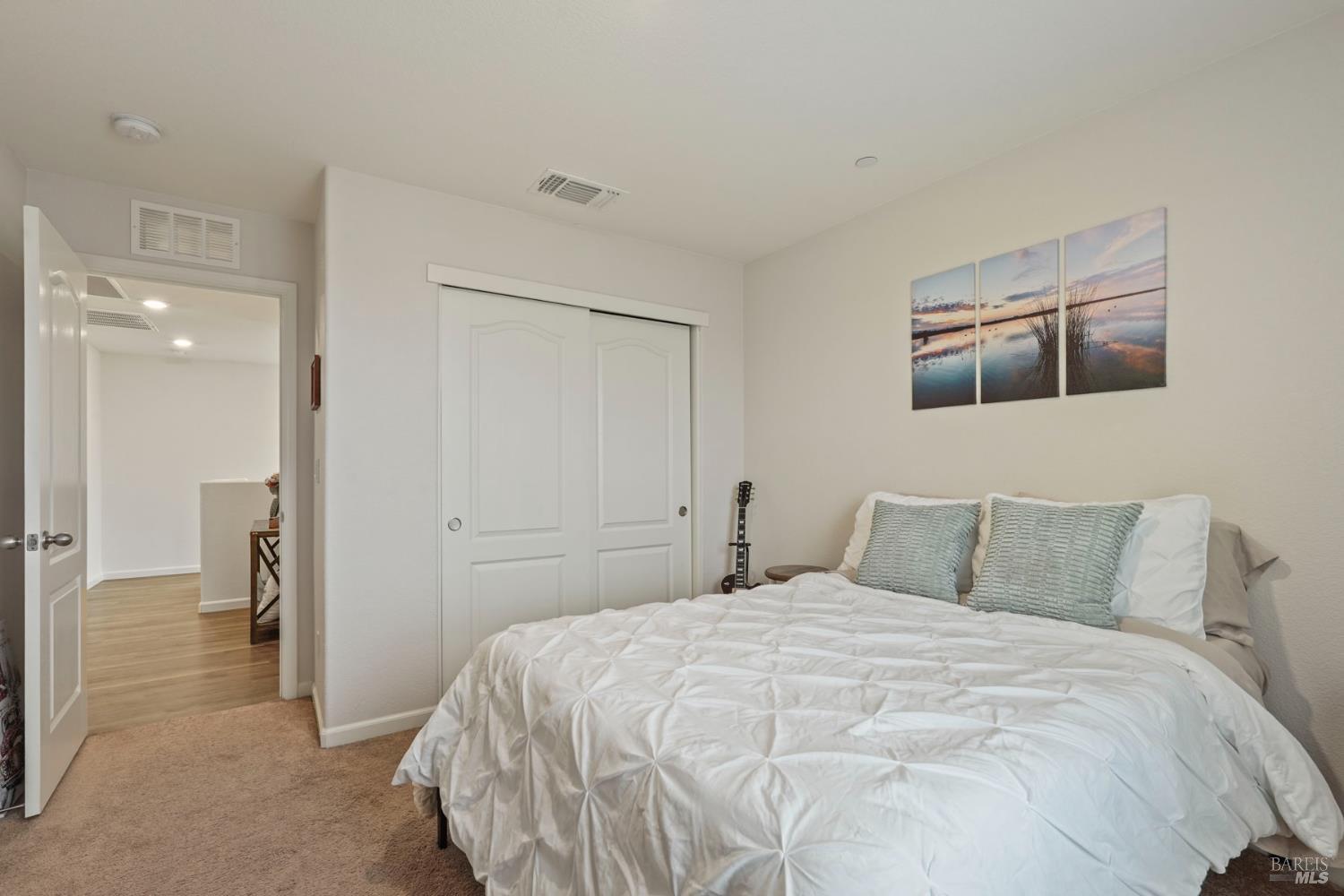 4725 Market Pl Square Rio Vista, CA 94571 - Photo 18 of 37 a bedroom with a bed and a painting