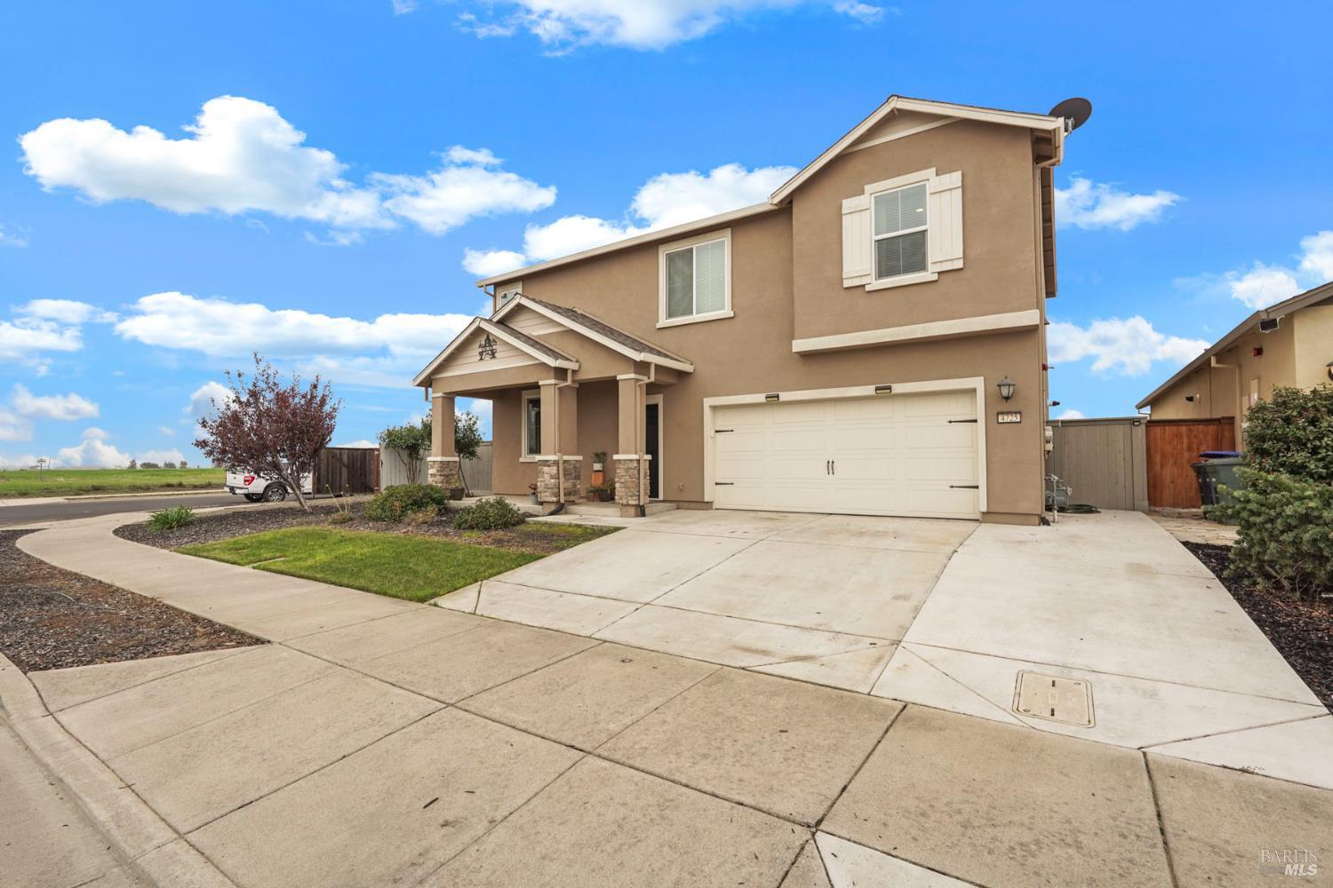 4725 Market Pl Square Rio Vista, CA 94571 - Photo 3 of 37 a front view of a house with yard