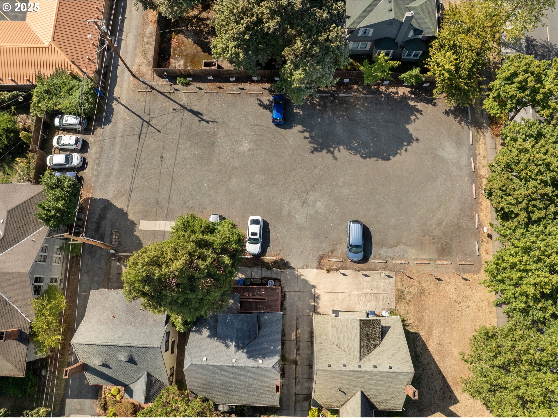 6th Street Springfield, OR 97477 - Photo 3 of 14 an aerial view of a house with a yard and lake view