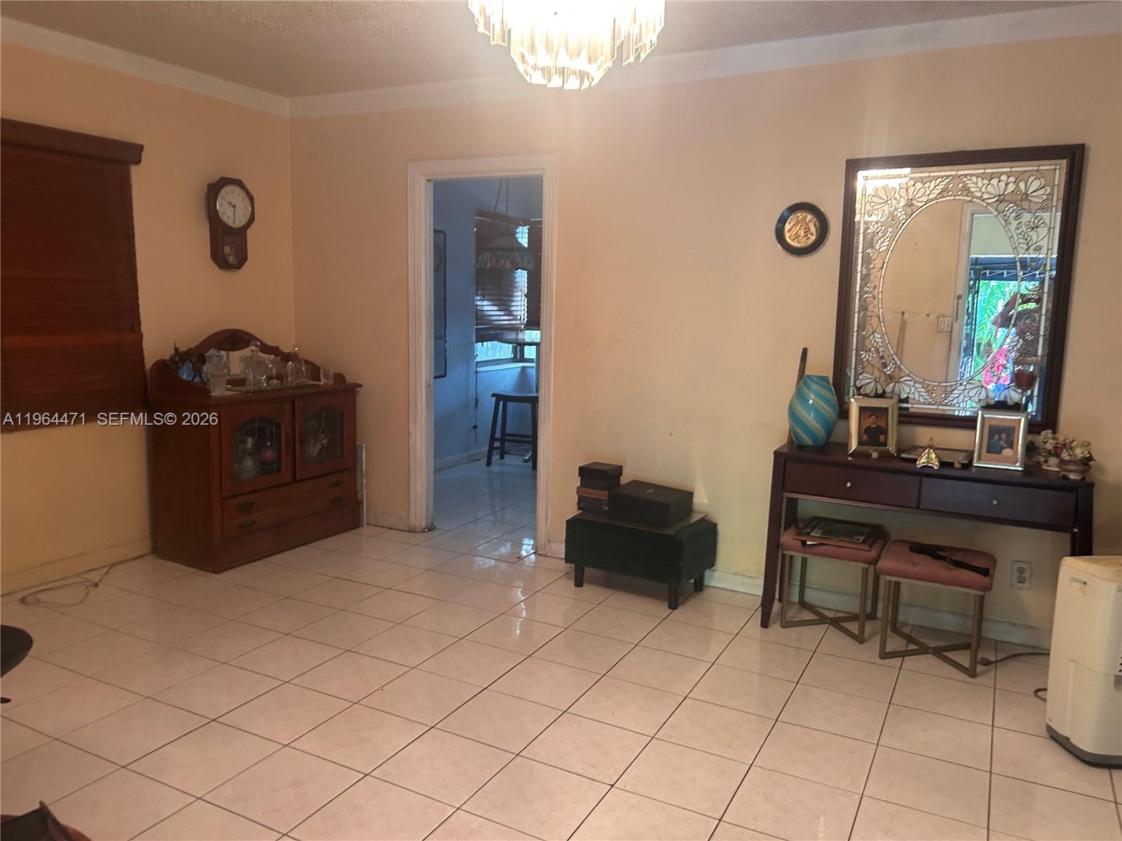 655 Northeast 82nd Street Miami, FL 33138 - Photo 5 of 12 a living room with furniture