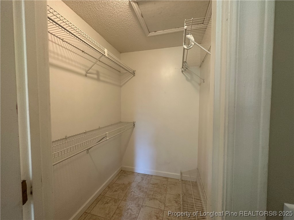 438 Crown Point Sanford, NC 27332 - Photo 7 of 15 a bathroom with a shower