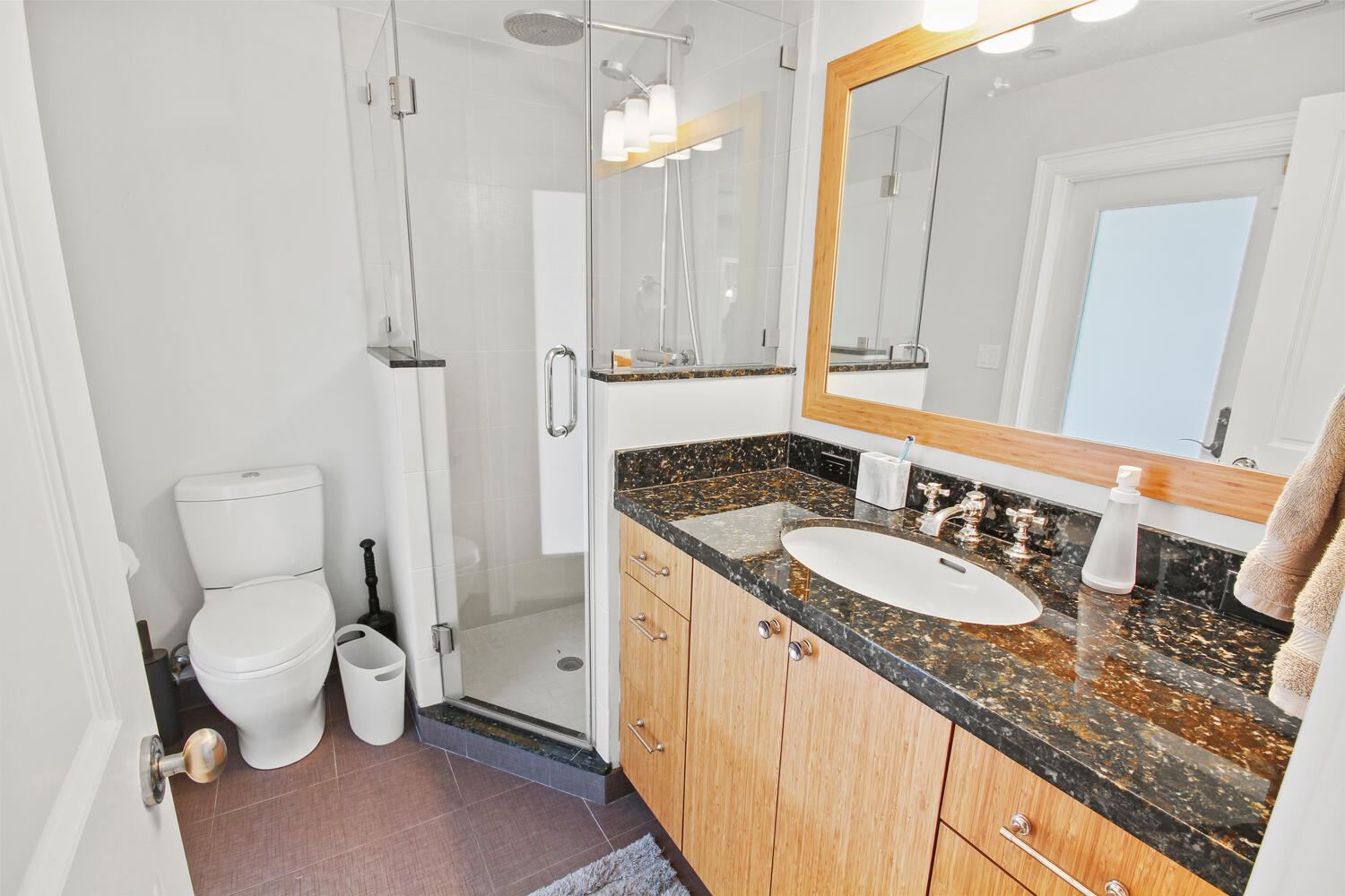 2425 Southeast 9th Street Pompano Beach, FL 33062 - Photo 20 of 91 a bathroom with a granite countertop sink mirror vanity and toilet
