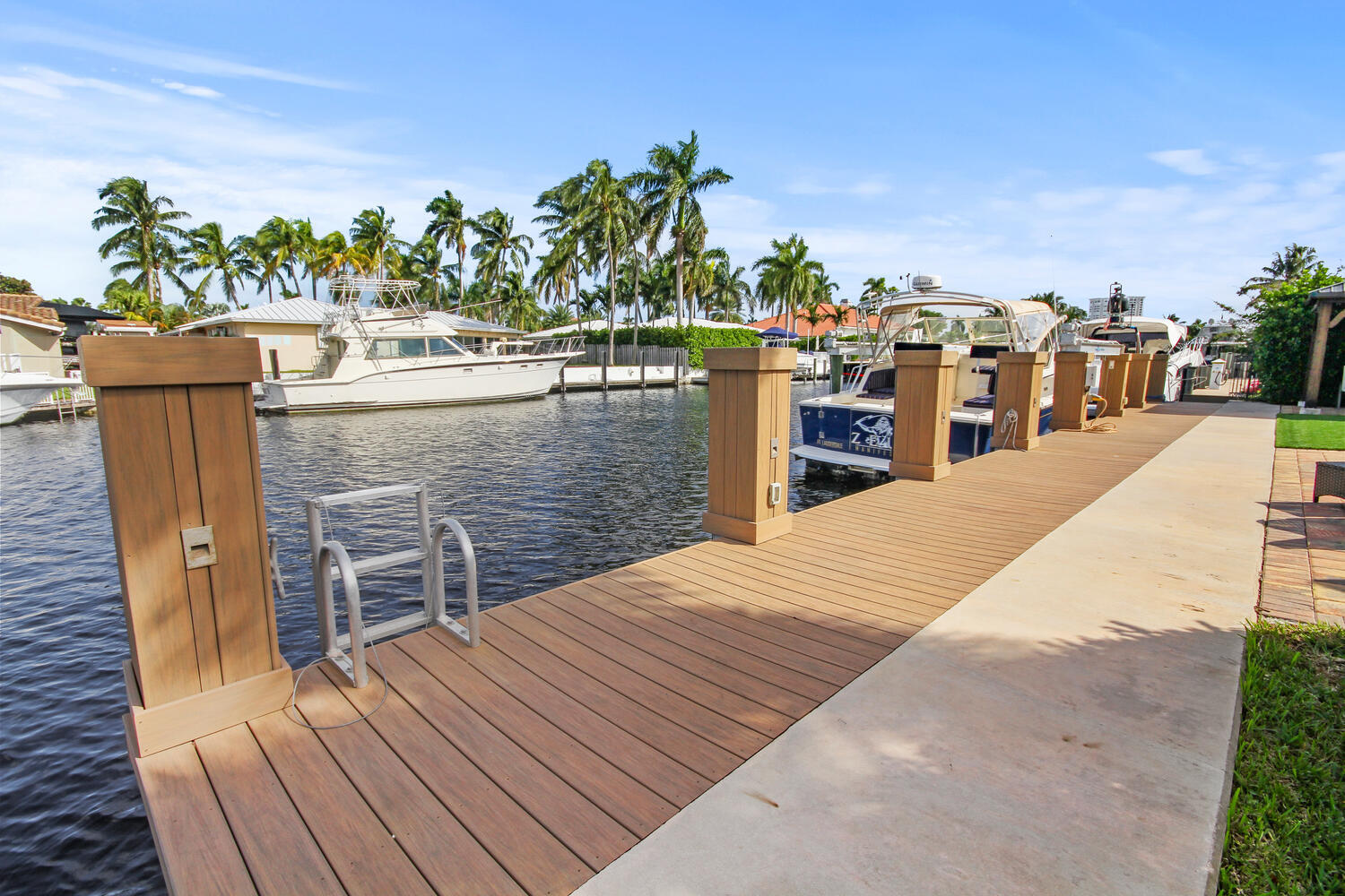 2425 Southeast 9th Street Pompano Beach, FL 33062 - Photo 42 of 91 a view of roof deck with two chairs and a table