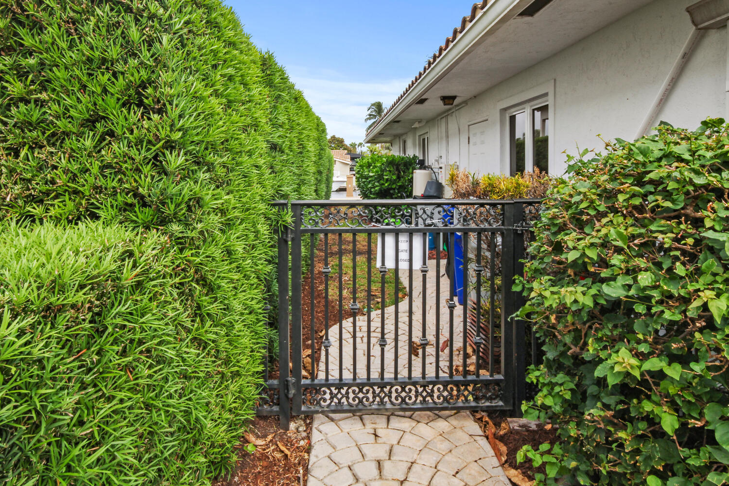 2425 Southeast 9th Street Pompano Beach, FL 33062 - Photo 50 of 91 a view of a porch with a small yard