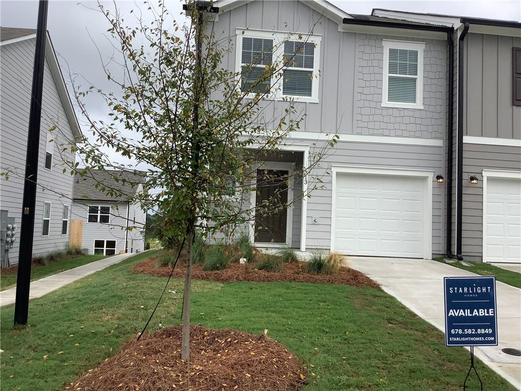412 Towson Street Villa Rica, GA 30180 - Photo 18 of 21 a view of a house with a yard and plants