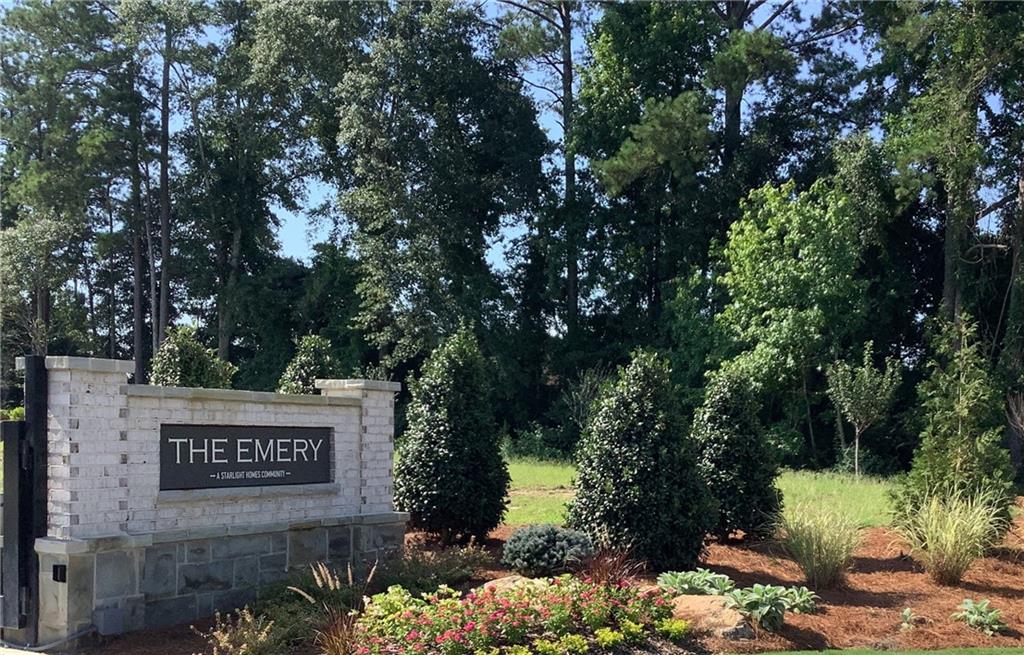 412 Towson Street Villa Rica, GA 30180 - Photo 21 of 21 a sign broad in front of flowers